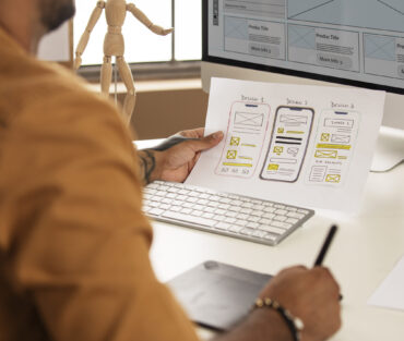 man-working-with-computer-side-view