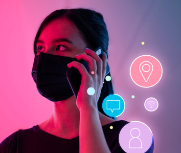 Networking during social distancing woman wearing mask talking on the phone