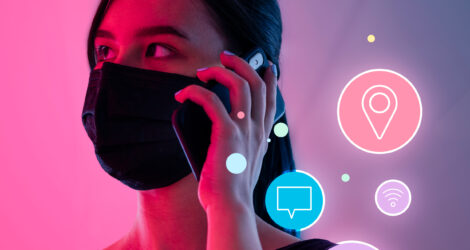 Networking during social distancing woman wearing mask talking on the phone